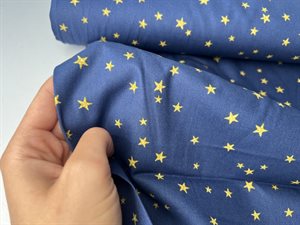 Poplin - guld stjerner på blå bund